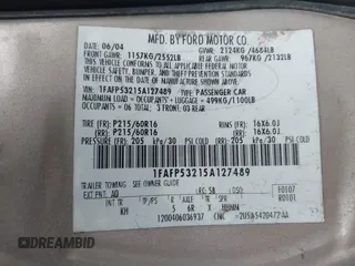 2005 Ford Taurus SE with VIN 1FAFP53215A127489, listed as a IAAI auction lot 40940239 with 127,180 mi miles. Bid and sale history available at carsss.com. Image 9.