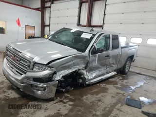 2018 GMC Sierra 1500 SLE z VIN 1GTV2MEH8JZ357073, wystawiony jako IAAI lot #41642234 z przebiegiem 105 007 mil mil oraz . Historia ofert i sprzedaży dostępna na DreamBid. Obrazek 17.