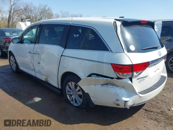 2016 Honda Odyssey EX-L with VIN 5FNRL5H68GB160563, listed as a IAAI auction lot 41962881 with 121,429 mi miles. Bid and sale history available at carsss.com. Image 3.