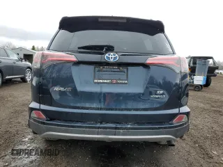 2018 Toyota RAV4 Hybrid SE with VIN JTMJJREV6JD225530, listed as a Copart auction lot 52000985 with 150,642 mi miles and Salvage title. Bid and sale history available at DreamBid. Image 6.