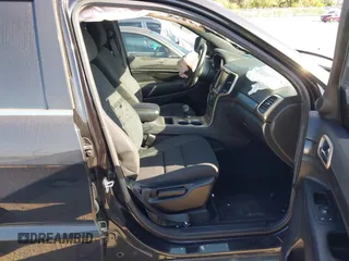 2014 Jeep Grand Cherokee Laredo with VIN 1C4RJEAG7EC263590, listed as a IAAI auction lot 41699106 with 136,581 mi miles and . Bid and sale history available at DreamBid. Image 5.