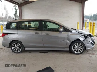 2014 Mazda 5 Touring with VIN JM1CW2CL6E0164146, listed as a IAAI auction lot 41458945 with 157,345 mi miles. Bid and sale history available at carsss.com. Image 13.