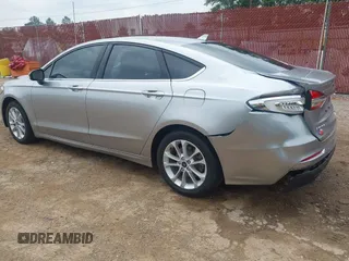 2020 Ford Fusion SE z VIN 3FA6P0LU4LR148070, wystawiony jako IAAI lot #42262446 z przebiegiem 69 057 mil mil oraz . Historia ofert i sprzedaży dostępna na DreamBid. Obrazek 3.