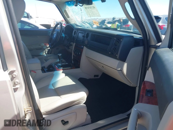 2006 Jeep Commander Limited z VIN 1J8HH58206C366040, wystawiony jako IAAI lot #40385858 z przebiegiem 313 805 mil mil oraz . Historia ofert i sprzedaży dostępna na DreamBid. Obrazek 5.