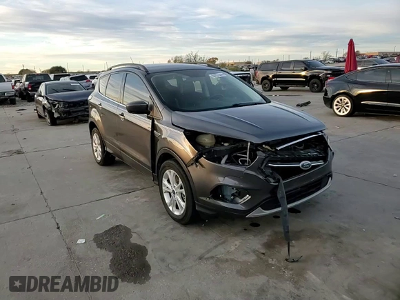 2017 Ford Escape SE with VIN 1FMCU0G91HUE07265, listed as a Copart auction lot 84231444 with 82,990 mi miles and Clean Title. Bid and sale history available at DreamBid. Image 15.