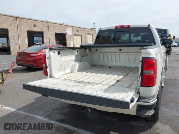 2014 GMC Sierra 1500 Denali z VIN 3GTU2WEJ3EG551266, wystawiony jako IAAI lot #41631624 z przebiegiem 120 214 mil mil oraz . Historia ofert i sprzedaży dostępna na DreamBid. Obrazek 17.