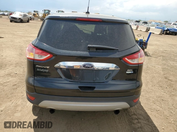 2013 Ford Escape SEL с VIN 1FMCU9H92DUA09513, выставлен на аукционе Copart как лот 60908785 с пробегом 82 348 миль миль и Списание • Salvage title. История ставок и продаж доступна на DreamBid. Изображение 6.