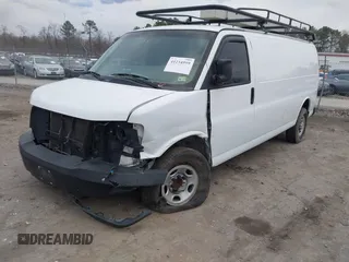 2017 Chevrolet Express Cargo Van with VIN 1GCWGBFG4H1348685, listed as a IAAI auction lot 41234959 with 215,067 mi miles. Bid and sale history available at carsss.com. Image 2.
