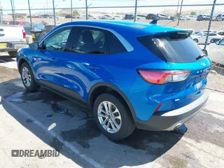 2021 Ford Escape SE with VIN 1FMCU9G6XMUA81082, listed as a IAAI auction lot 42056323 with 83,904 mi miles. Bid and sale history available at carsss.com. Image 3.