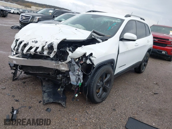 2016 Jeep Cherokee Latitude with VIN 1C4PJMCSXGW214243, listed as a IAAI auction lot 40850362 with 96,240 mi miles and . Bid and sale history available at carsss.com. Image 2.
