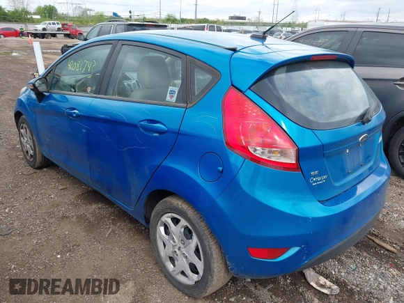2013 Ford Fiesta SE with VIN 3FADP4EJ0DM158451, listed as a IAAI auction lot 42083743 with 111,919 mi miles. Bid and sale history available at carsss.com. Image 3.
