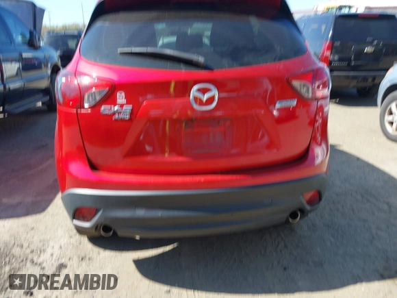 2016 Mazda CX-5 Sport with VIN JM3KE4BY7G0805631, listed as a IAAI auction lot 42028606 with 93,659 mi miles and . Bid and sale history available at carsss.com. Image 16.