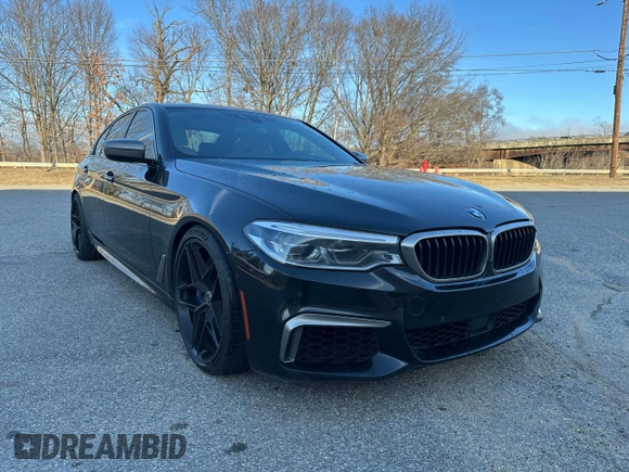 2018 BMW 5 Series M550i xDrive with VIN WBAJB9C55JB035226, listed as a Copart auction lot 60850325 with 156,183 mi miles and Clean title. Bid and sale history available at DreamBid. Image 2.