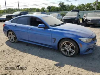2015 BMW 4 Series 428i xDrive with VIN WBA4C9C5XFG135004, listed as a Copart auction lot 60551714 with 209,083 mi miles and Salvage Title. Bid and sale history available at DreamBid. Image 4.