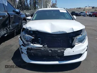 2016 Kia Optima LX with VIN 5XXGT4L37GG121295, listed as a IAAI auction lot 41922348 with 82,238 mi miles. Bid and sale history available at carsss.com. Image 13.