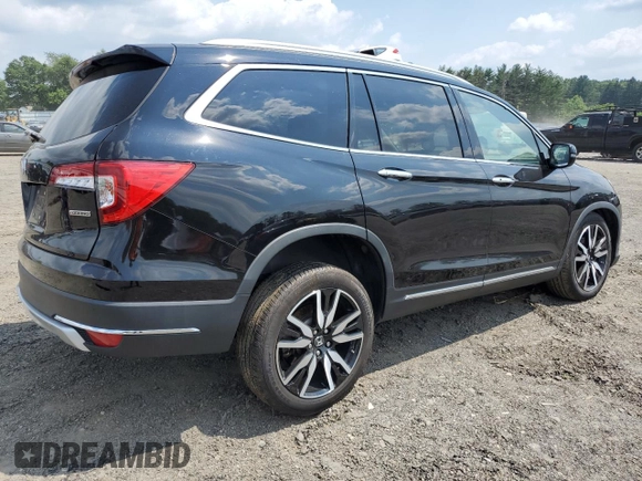 2020 Honda Pilot Touring 8-Passenger with VIN 5FNYF5H95LB021658, listed as a Copart auction lot 58878594 with 36,122 mi miles and Salvage Title. Bid and sale history available at DreamBid. Image 3.