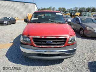 2001 Ford F-150 SuperCrew XLT with VIN 1FTRW07W91KE40272, listed as a Copart auction lot 75063324 with 218,183 mi miles and Salvage Title. Bid and sale history available at carsss.com. Image 6.