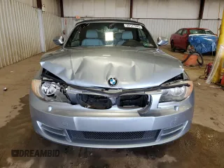 2011 BMW 1 Series 128i with VIN WBAUL7C57BVM80274, listed as a Copart auction lot 52127595 with 104,952 mi miles and Salvage title. Bid and sale history available at DreamBid. Image 5.
