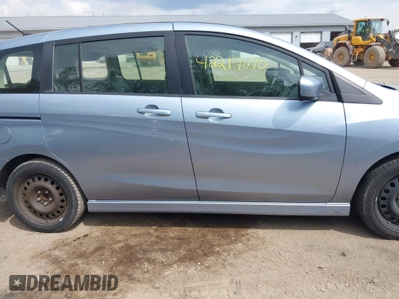 2012 Mazda 5 Grand Touring z VIN JM1CW2DL2C0127851, wystawiony jako IAAI lot #42217090 z przebiegiem 123 900 mil mil oraz . Historia ofert i sprzedaży dostępna na DreamBid. Obrazek 13.