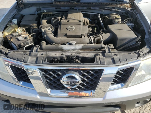 2012 Nissan Frontier SV z VIN 1N6AD0ERXCC477695, wystawiony jako Copart lot #56377185 z przebiegiem 152 497 mil mil oraz Szkoda całkowita • Salvage title. Historia ofert i sprzedaży dostępna na DreamBid. Obrazek 11.