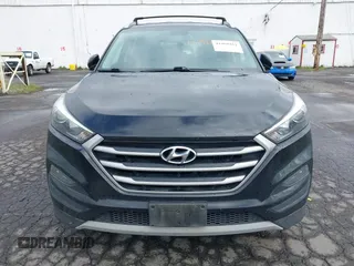 2017 Hyundai Tucson Value with VIN KM8J3CA28HU394750, listed as a IAAI auction lot 41960452 with 138,134 mi miles. Bid and sale history available at carsss.com. Image 6.