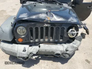 2008 Jeep Wrangler Unlimited X z VIN 1J4GA391X8L532319, wystawiony jako Copart lot #57292495 z przebiegiem Nie podano mil oraz Szkoda całkowita • Salvage title. Historia ofert i sprzedaży dostępna na DreamBid. Obrazek 11.