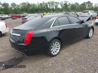 2014 Cadillac CTS AWD z VIN 1G6AW5SX6E0175566, wystawiony jako IAAI lot #42350632 z przebiegiem 41 610 mil mil oraz . Historia ofert i sprzedaży dostępna na DreamBid. Obrazek 4.