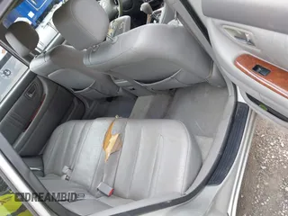 2002 Toyota Avalon XL with VIN 4T1BF28B12U234616, listed as a IAAI auction lot 41954288 with 148,418 mi miles. Bid and sale history available at carsss.com. Image 8.
