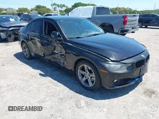 2015 BMW 3 Series 328i with VIN WBA3C1C58FK123489, listed as a IAAI auction lot 42026400 with 127,880 mi miles and . Bid and sale history available at carsss.com. Image 1.