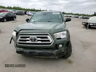 2021 Toyota Tacoma SR z VIN 3TYCZ5AN3MT046066, wystawiony jako Copart lot #54785665 z przebiegiem 57 897 mil mil oraz Szkoda całkowita • Salvage title. Historia ofert i sprzedaży dostępna na DreamBid. Obrazek 13.
