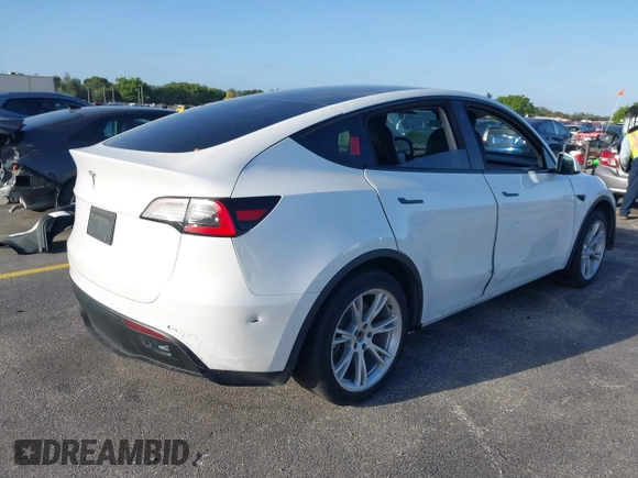 2021 Tesla Model Y Standard Range with VIN 5YJYGDED3MF103650, listed as a IAAI auction lot 41726278 with Not Provided miles and . Bid and sale history available at DreamBid. Image 4.