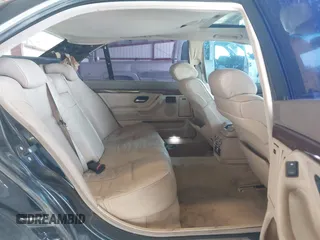 1999 BMW 7 Series 740il with VIN WBAGH8336XDP03839, listed as a IAAI auction lot 42067133 with 163,345 mi miles. Bid and sale history available at carsss.com. Image 8.