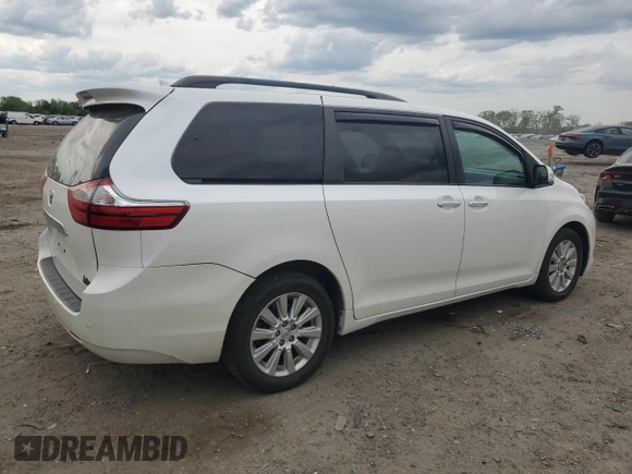 2015 Toyota Sienna Limited with VIN 5TDDK3DCXFS114465, listed as a Copart auction lot 54155605 with 105,937 mi miles and Salvage Title. Bid and sale history available at DreamBid. Image 3.