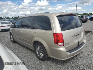 2014 Dodge Grand Caravan SXT 30th Anniversary with VIN 2C4RDGCG2ER328126, listed as a Copart auction lot 74277684 with Not Provided miles and Salvage Title. Bid and sale history available at DreamBid. Image 2.