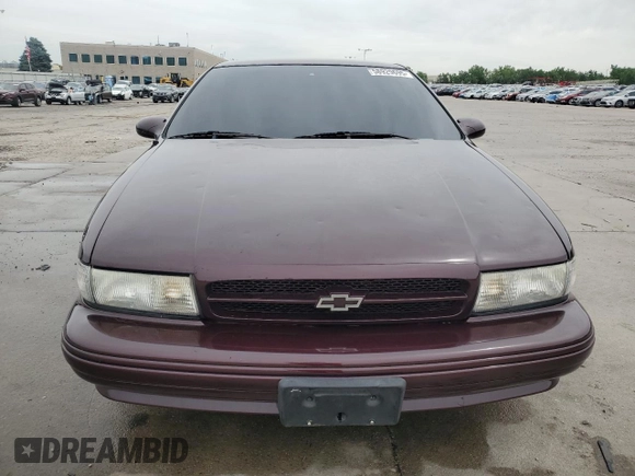 1996 Chevrolet Caprice 1SA Special Value with VIN 1G1BL52P7TR169402, listed as a Copart auction lot 58929695 with 152,433 mi miles and Clean title. Bid and sale history available at DreamBid. Image 5.