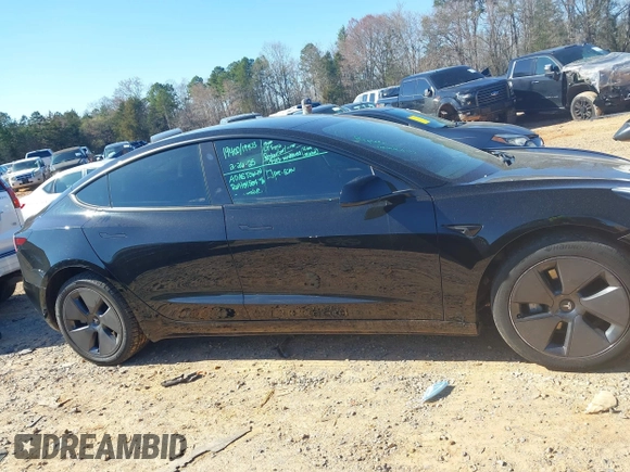 2023 Tesla Model 3 Long Range with VIN 5YJ3E1EB6PF634116, listed as a IAAI auction lot 41814670 with 47,801 mi miles and . Bid and sale history available at DreamBid. Image 14.