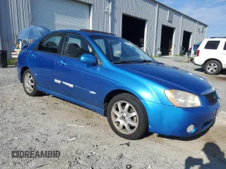 2005 Kia Spectra LX z VIN KNAFE121655113045, wystawiony jako Copart lot #61199595 z przebiegiem 156 310 mil mil oraz Szkoda całkowita • Salvage title. Historia ofert i sprzedaży dostępna na DreamBid. Obrazek 4.