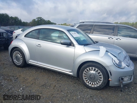 2016 Volkswagen Beetle SE с VIN 3VWJ17AT3GM606917, выставлен на аукционе IAAI как лот 41728053 с пробегом Не указан миль и . История ставок и продаж доступна на DreamBid. Изображение 13.