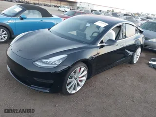 2019 Tesla Model 3 Long Range with VIN 5YJ3E1EBXKF393329, listed as a IAAI auction lot 41586996 with 70,269 mi miles. Bid and sale history available at carsss.com. Image 20.