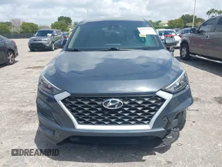 2021 Hyundai Tucson SE with VIN KM8J23A41MU291085, listed as a IAAI auction lot 41956974 with 93,932 mi miles. Bid and sale history available at carsss.com. Image 12.