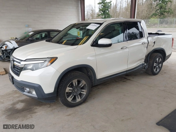 2017 Honda Ridgeline RTL-E with VIN 5FPYK3F7XHB030551, listed as a IAAI auction lot 41903844 with 153,594 mi miles. Bid and sale history available at carsss.com. Image 17.
