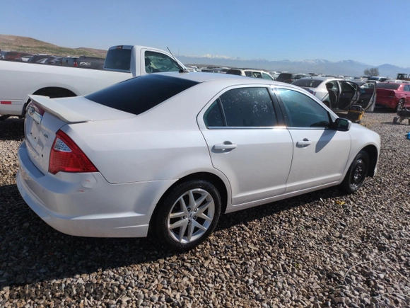 2012 Ford Fusion SEL z VIN 3FAHP0JA7CR434058, wystawiony jako Copart lot #52989875 z przebiegiem 109 914 mil mil oraz Szkoda całkowita • Salvage title. Historia ofert i sprzedaży dostępna na DreamBid. Obrazek 3.