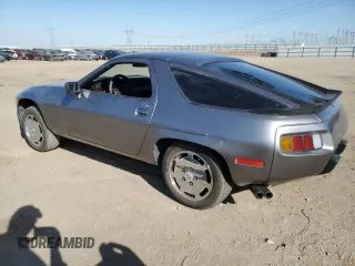 1985 Porsche 928 z VIN WP0JB0927FS862258, wystawiony jako Copart lot #71369064 z przebiegiem 32 896 mil mil oraz Szkody całkowita. Historia ofert i sprzedaży dostępna na DreamBid. Obrazek 2.