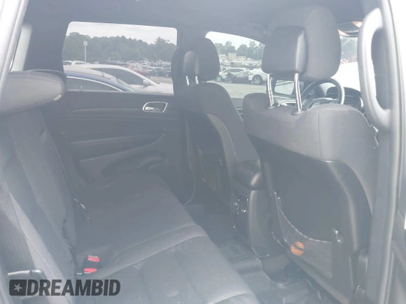 2018 Jeep Grand Cherokee Laredo E with VIN 1C4RJFAG4JC475993, listed as a IAAI auction lot 42295008 with 106,024 mi miles and . Bid and sale history available at DreamBid. Image 8.