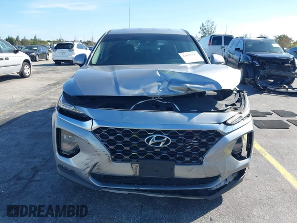 2020 Hyundai Santa Fe SEL with VIN 5NMS3CAD5LH218667, listed as a IAAI auction lot 41025347 with 81,632 mi miles and . Bid and sale history available at DreamBid. Image 12.