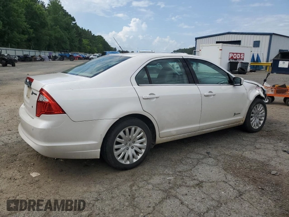 2012 Ford Fusion Hybrid с VIN 3FADP0L35CR184476, выставлен на аукционе Copart как лот 63907885 с пробегом 230 589 миль миль и Списание • Salvage title. История ставок и продаж доступна на DreamBid. Изображение 3.