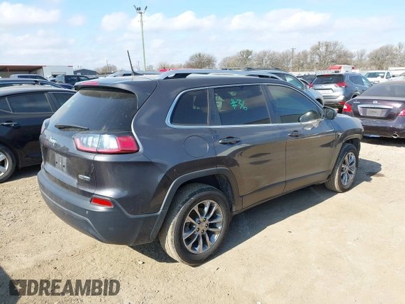 2020 Jeep Cherokee Altitude with VIN 1C4PJLLB5LD580742, listed as a IAAI auction lot 41483128 with 77,127 mi miles. Bid and sale history available at carsss.com. Image 4.