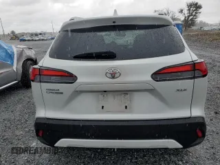 2023 Toyota Corolla Cross XLE с VIN 7MUDAAAG6PV071281, выставлен на аукционе Copart как лот 59691915 с пробегом Не указан миль и Списание • Salvage title. История ставок и продаж доступна на DreamBid. Изображение 6.
