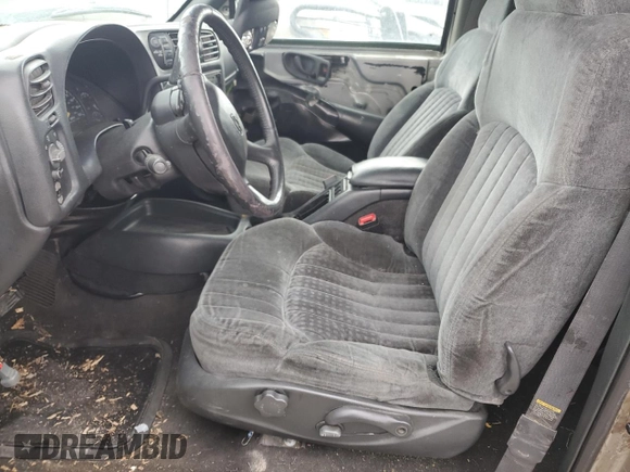 1999 Chevrolet Blazer Trailblazer z VIN 1GNDT13W9X2238417, wystawiony jako Copart lot #80087223 z przebiegiem Nie podano mil oraz Szkoda całkowita • Salvage title. Historia ofert i sprzedaży dostępna na DreamBid. Obrazek 7.