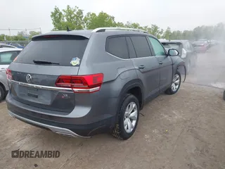 2018 Volkswagen Atlas SE z VIN 1V2KR2CAXJC517240, wystawiony jako IAAI lot #42361370 z przebiegiem 129 546 mil mil oraz . Historia ofert i sprzedaży dostępna na DreamBid. Obrazek 4.